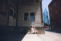 woman sitting outdoors in the sunlight