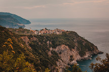 village and sea cliff 