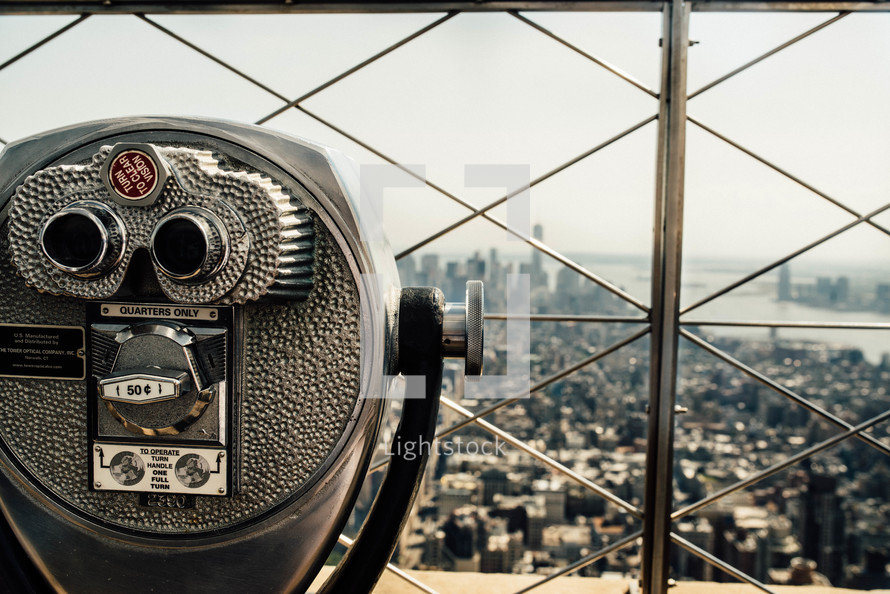 a viewfinder scope at the top of a skyscraper in NYC 