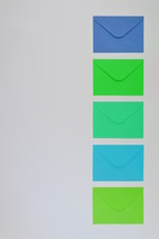 blue and green envelopes 