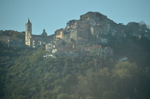 town on a hill visible from afar