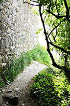 path near castle walls 