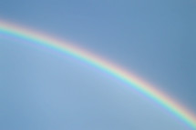 rainbow in a blue sky 