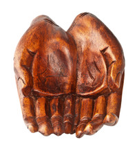 Hands of wood carved by hand on white background.