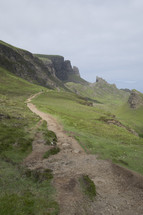 path on a mountainside near the ocean 