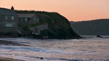 Beach Cottages And Gentle Ocean Waves At Sunrise