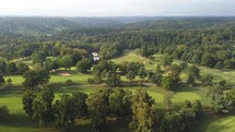 Aerial view of a golf course in the mountains