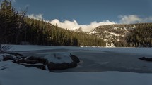 Time lapse of clouds rolling over mountains in Rocky Mountain National Park in Colorado.