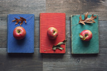 vintage books with apples 