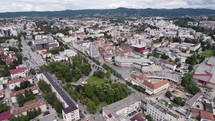 Aerial orbit city Banja Luka Boska shopping center and park, skyline panorama