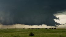 Wall Cloud Developing Timelapse With Cars on Bust Highway.