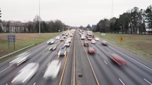 Timelapse of six lanes of busy, interstate traffic