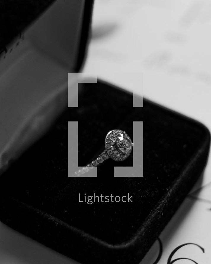 diamond engagement ring in a box 
