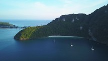 Aerial cinematic drone May Bay lone sailboats