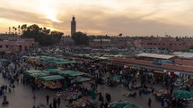 Sunset timelapse at Jemaa el-Fnaa Square and Market Place in Medina Quarter Old City Marrakesh, Morocco