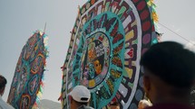 People Admiring The Creative Designs Of Giant Kites During The Festival In Sumpango, Sacatepéquez Guatemala. Low Angle
