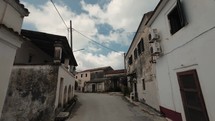Corfu island, Greece - 2023.07.01 - 09: Enjoy a sunny holiday drive through a charming village on Corfu Island