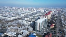 Aerial View Of High-rise Buildings And Ice-covered Trees During Winter In Galati, Romania.	