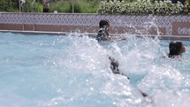 145 Asian Kids Splashing In Swimming Pool