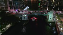 Reveal Shot of Boat and Brickell Avenue in Downtown Miami