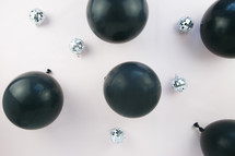 black balloons and mirrored disco balls 