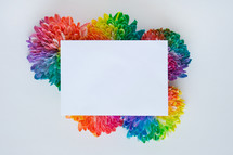 rainbow flowers with white notecard 