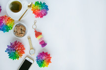 rainbow flowers, cellphone, watch, tea 