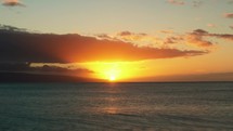 sunset on a beach in Maui 