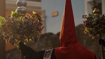 Man In Red Hood During Lent Procession In Antigua, Guatemala. Close Up	