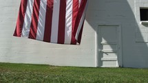American flag on the side of a barn 