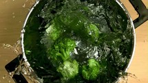 Broccoli with water drops. Filmed is slow motion 1000 fps