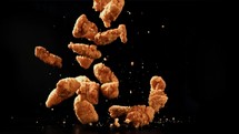 Chicken nuggets.  Filmed is slow motion 1000 fps.