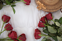 red roses and woven basket 