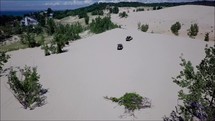 sand dunes and dune buggy 