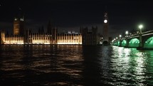 Houses of Parliament and Westminster Bridge at night in London, UK