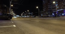 Timelapse Of Traffic Traveling In The Busy Street Of Galati City At Night In Romania.