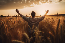 Man standing in the harvest fields praying to the Lord of the Harvest