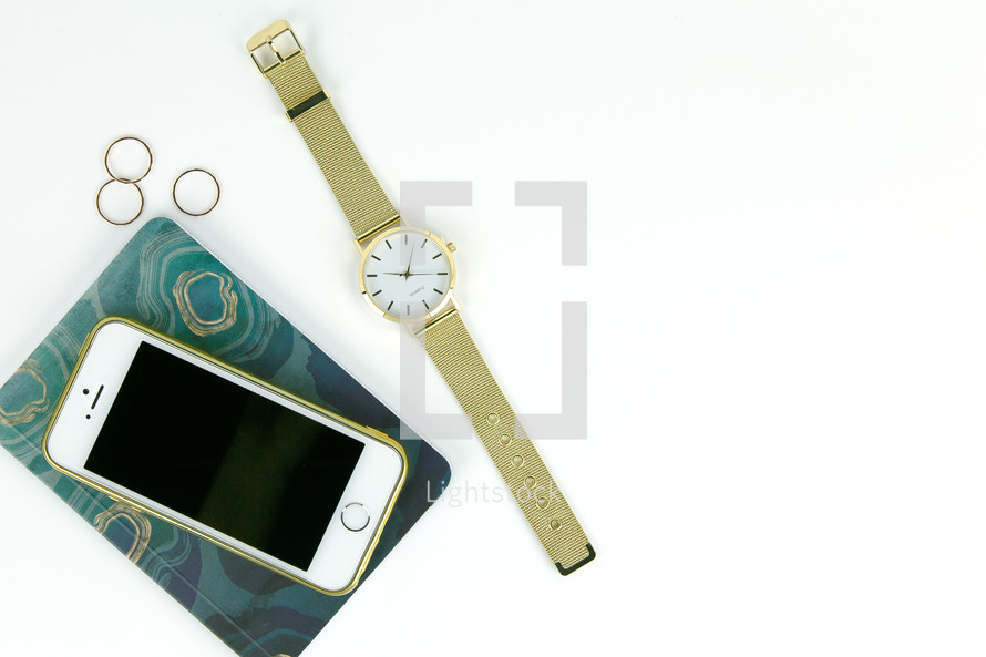 watch, notebook, iPhone, rings