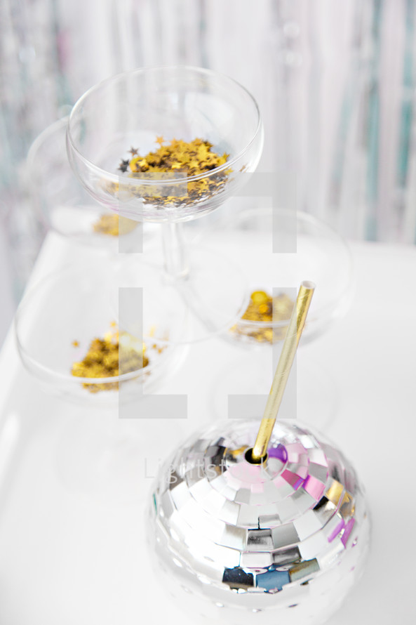 star confetti and disco ball drink with straw 