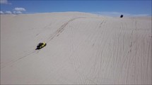 trucks on sand dunes 