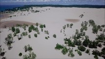 sand dunes and dune buggy 