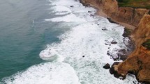 Aerial Cinematic drone rugged coastline cliffs Santa Cruz 