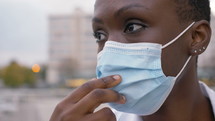 female healthcare worker wearing a mask 
