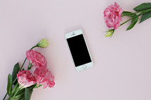 pink carnations and cellphone 