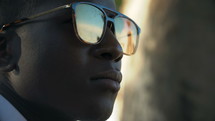 a man in sunglasses 