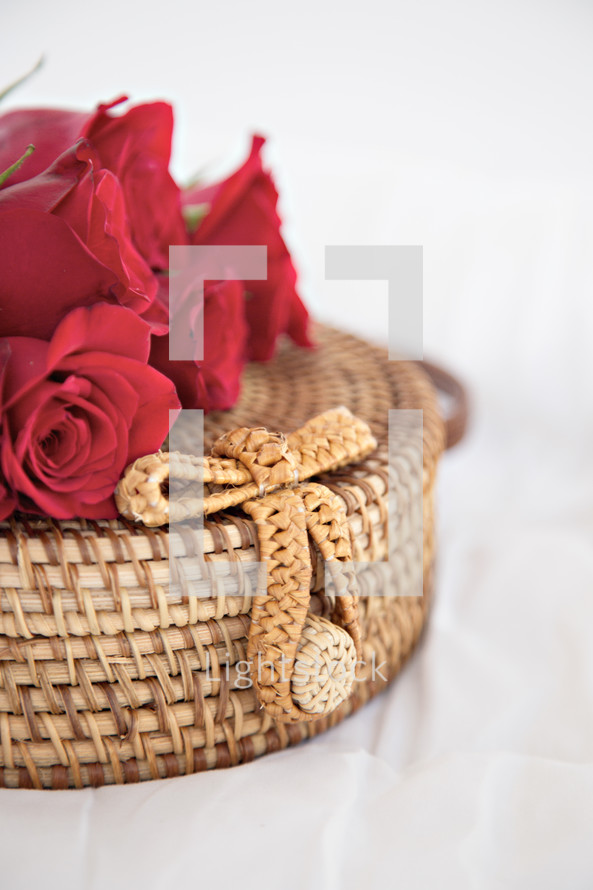 red roses on a basket 