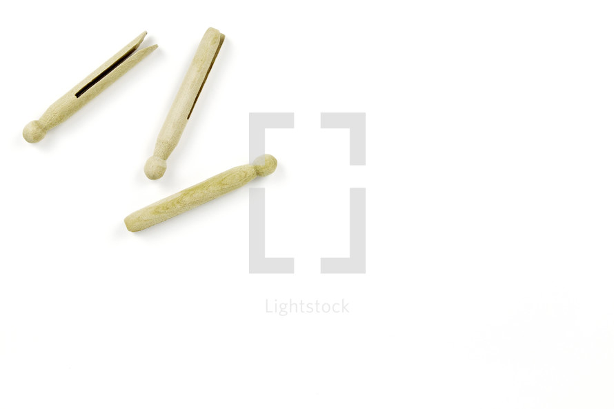 vintage clothespins on a white background 