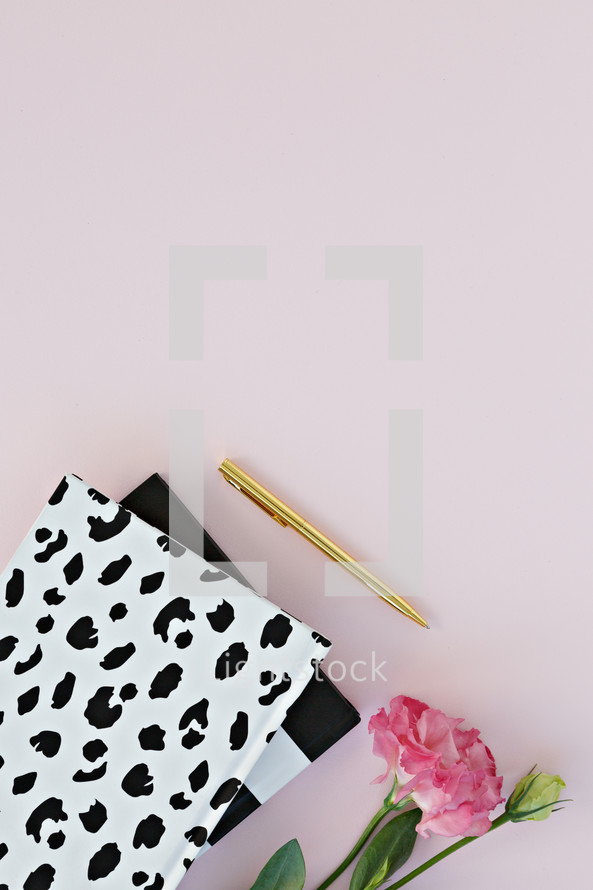 dalmatian spotted notebook, pink carnation, and gold pen 