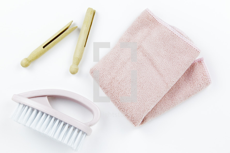 pink towel, brush, and vintage clothespins 