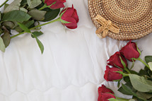 red roses and woven basket 